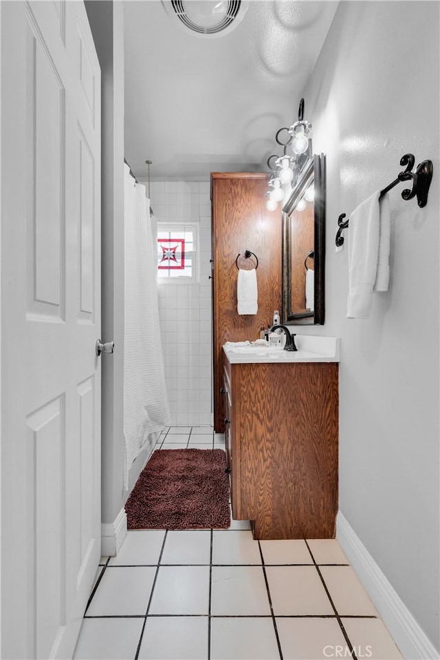 2309 E Glenoaks Blvd, Glendale, CA 91206 - bathroom featuring vanity, curtained shower, and tile patterned floors