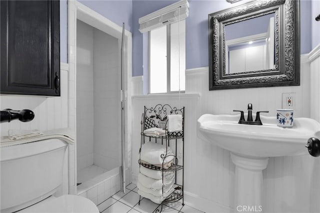 2309 E Glenoaks Blvd, Glendale, CA 91206 - full bath featuring toilet, tiled shower, wainscoting, tile patterned flooring, and a sink