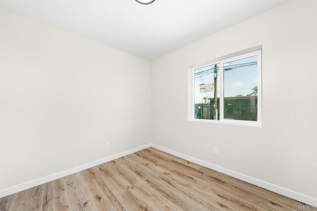 49694971-4973 N 72nd St, San Diego, CA 92115 - spare room with baseboards and wood finished floors