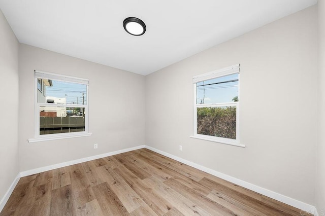 49694971-4973 N 72nd St, San Diego, CA 92115 - empty room with baseboards and wood finished floors