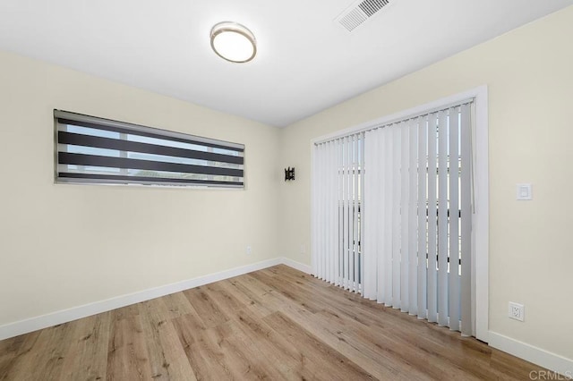 49694971-4973 N 72nd St, San Diego, CA 92115 - unfurnished room with wood finished floors and baseboards