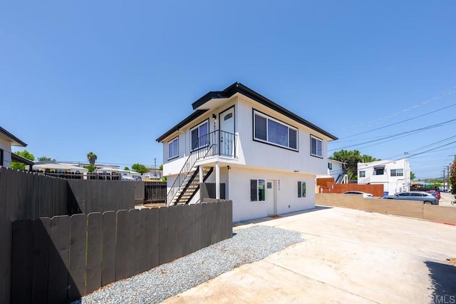49694971-4973 N 72nd St, San Diego, CA 92115 - back of property with stairway and a patio area