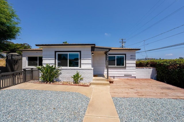 49694971-4973 N 72nd St, San Diego, CA 92115 - view of front facade with a wooden deck