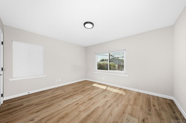 49694971-4973 N 72nd St, San Diego, CA 92115 - empty room with wood finished floors and baseboards