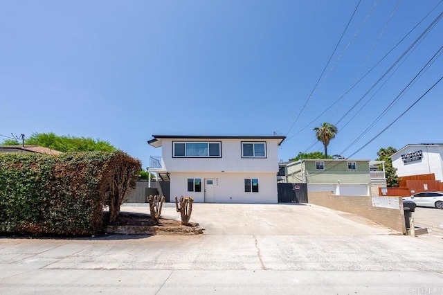 49694971-4973 N 72nd St, San Diego, CA 92115 - view of front of property featuring concrete driveway and stucco siding