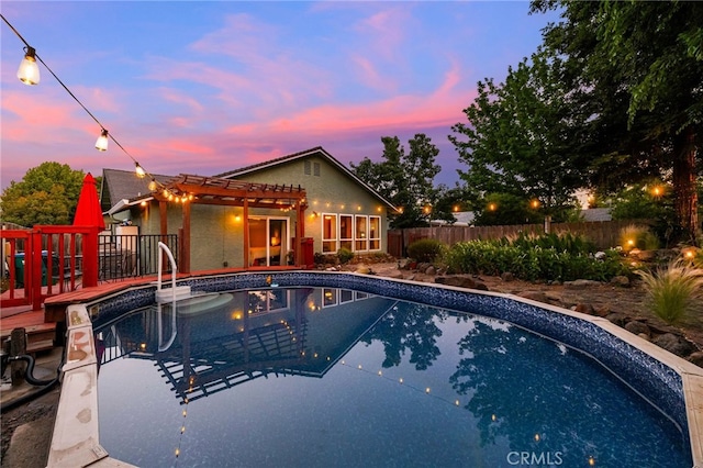 13 Avante Way, Chico, CA 95973 - pool at dusk featuring a pergola and a deck