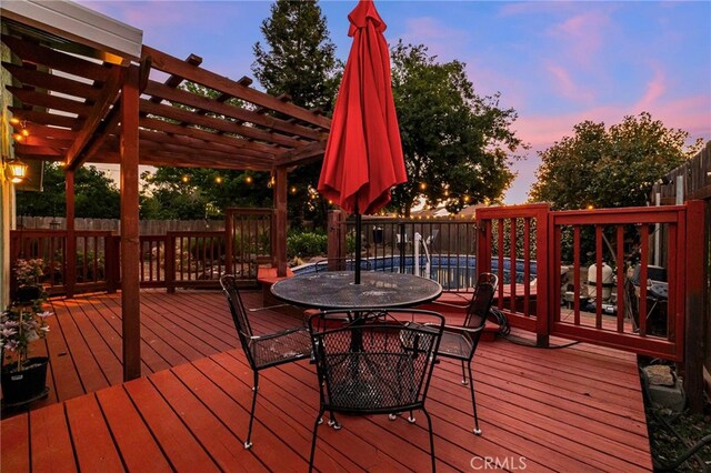 13 Avante Way, Chico, CA 95973 - deck featuring a pergola and outdoor dining area