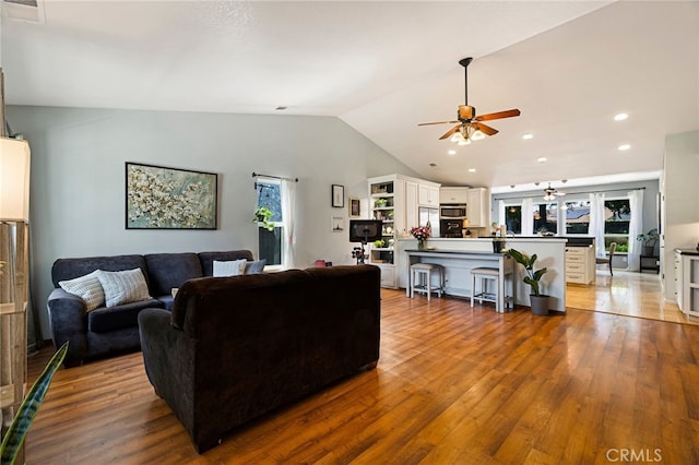 13 Avante Way, Chico, CA 95973 - living area with a ceiling fan, plenty of natural light, vaulted ceiling, wood finished floors, and recessed lighting