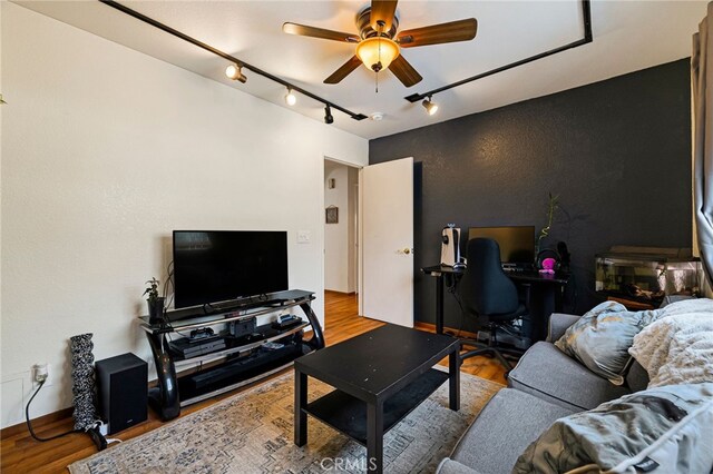 13 Avante Way, Chico, CA 95973 - living room with rail lighting, ceiling fan, wood finished floors, a desk, and baseboards
