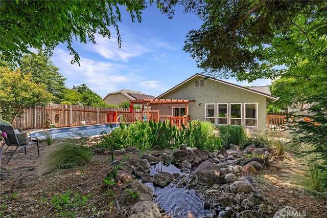 13 Avante Way, Chico, CA 95973 - fenced backyard with a pergola