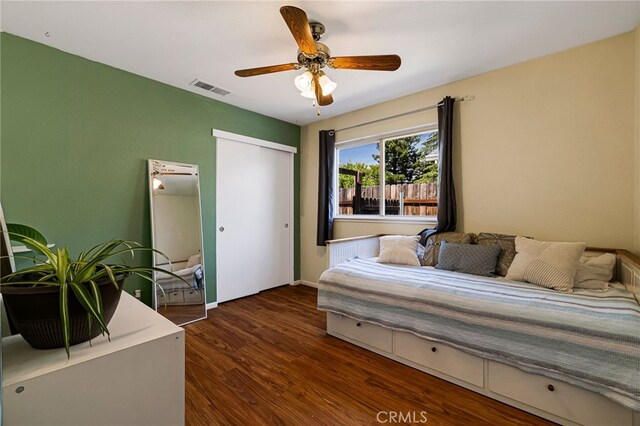 13 Avante Way, Chico, CA 95973 - bedroom with dark wood-style floors, a closet, ceiling fan, and baseboards