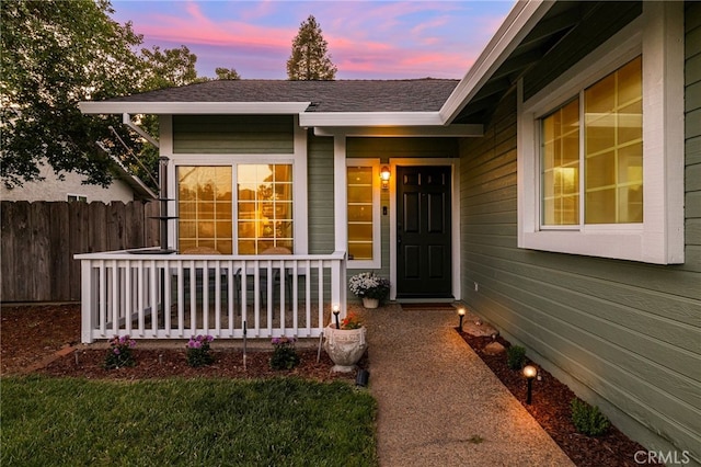 13 Avante Way, Chico, CA 95973 - exterior entry at dusk featuring covered porch and a shingled roof