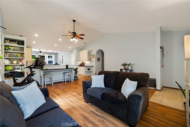 13 Avante Way, Chico, CA 95973 - living area featuring ceiling fan, lofted ceiling, arched walkways, wood finished floors, and recessed lighting