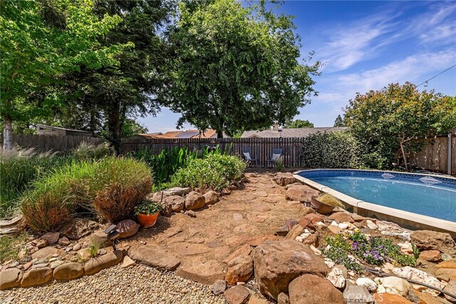 13 Avante Way, Chico, CA 95973 - view of swimming pool featuring a fenced backyard