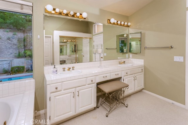 17910 Montague Ct, Granada Hills, CA 91344 - full bathroom featuring double vanity, a tub with jets, and baseboards