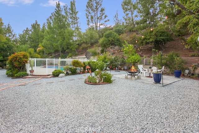 17910 Montague Ct, Granada Hills, CA 91344 - view of yard with a patio area and an outdoor fire pit