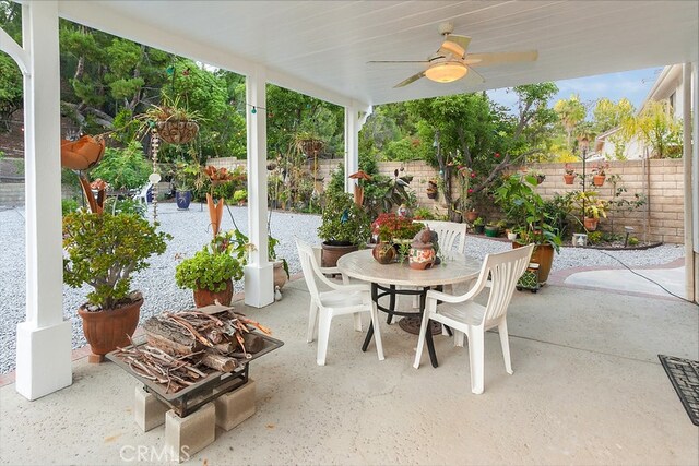 17910 Montague Ct, Granada Hills, CA 91344 - fenced backyard featuring outdoor dining space, a patio, and a ceiling fan
