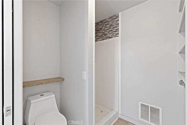 25360 Kuffel Rd, Menifee, CA 92585 - bathroom with toilet, a stall shower, and wood finished floors