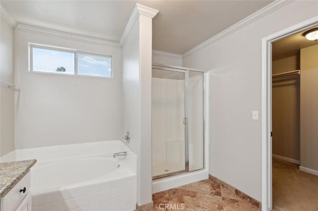 7538 N Erie Ave, Fresno, CA 93722 - bathroom with a stall shower, a bath, vanity, a spacious closet, and ornamental molding