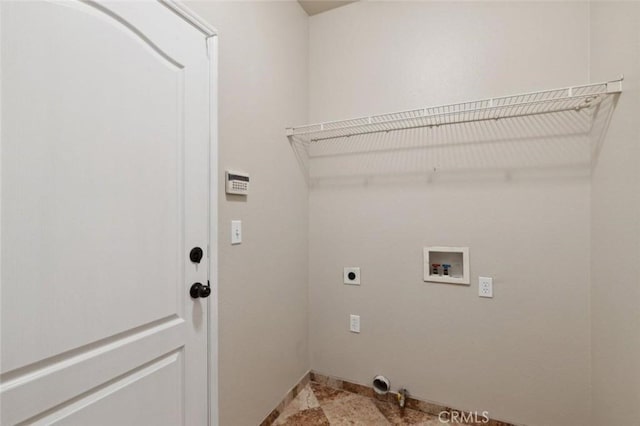 7538 N Erie Ave, Fresno, CA 93722 - laundry room featuring hookup for a washing machine, hookup for an electric dryer, and baseboards
