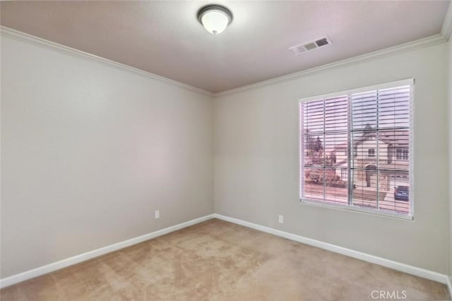 7538 N Erie Ave, Fresno, CA 93722 - spare room with light carpet, crown molding, and baseboards