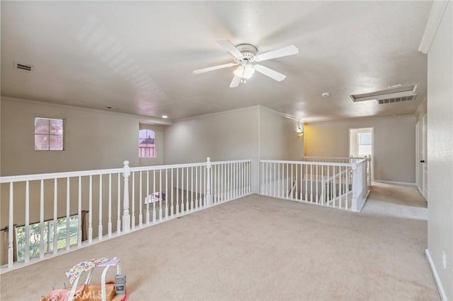 7538 N Erie Ave, Fresno, CA 93722 - carpeted spare room featuring a ceiling fan and ornamental molding
