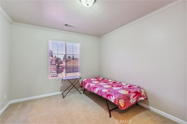 7538 N Erie Ave, Fresno, CA 93722 - bedroom with ornamental molding and carpet floors