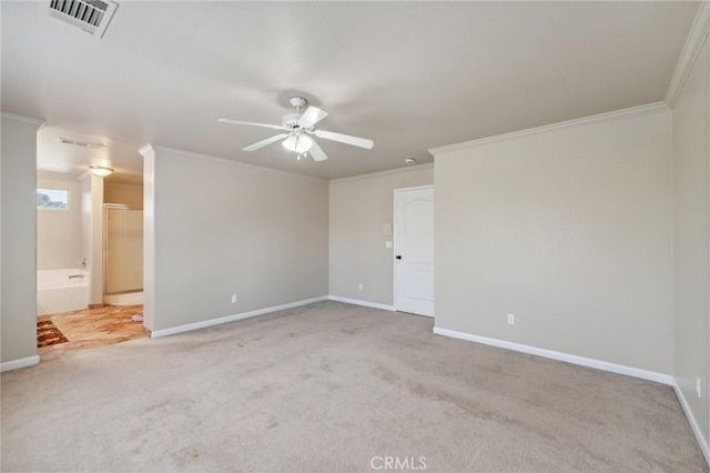 7538 N Erie Ave, Fresno, CA 93722 - spare room featuring ceiling fan, carpet floors, and ornamental molding