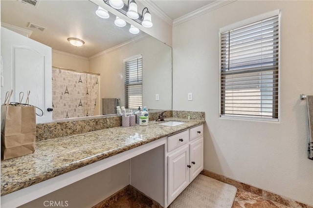 7538 N Erie Ave, Fresno, CA 93722 - full bath featuring vanity, ornamental molding, and curtained shower