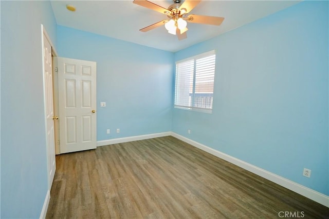 29429 Masters Dr, Murrieta, CA 92563 - spare room featuring baseboards, wood finished floors, a ceiling fan, and a smoke detector