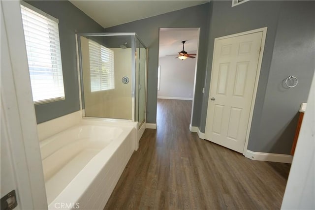 29429 Masters Dr, Murrieta, CA 92563 - bathroom featuring a stall shower, wood finished floors, a bath, lofted ceiling, and a ceiling fan