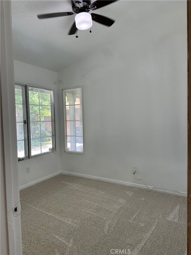 2582 Buchanan Ct, Perris, CA 92571 - carpeted spare room with baseboards and ceiling fan