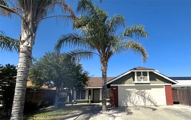 2582 Buchanan Ct, Perris, CA 92571 - view of front facade with an attached garage, driveway, and brick siding