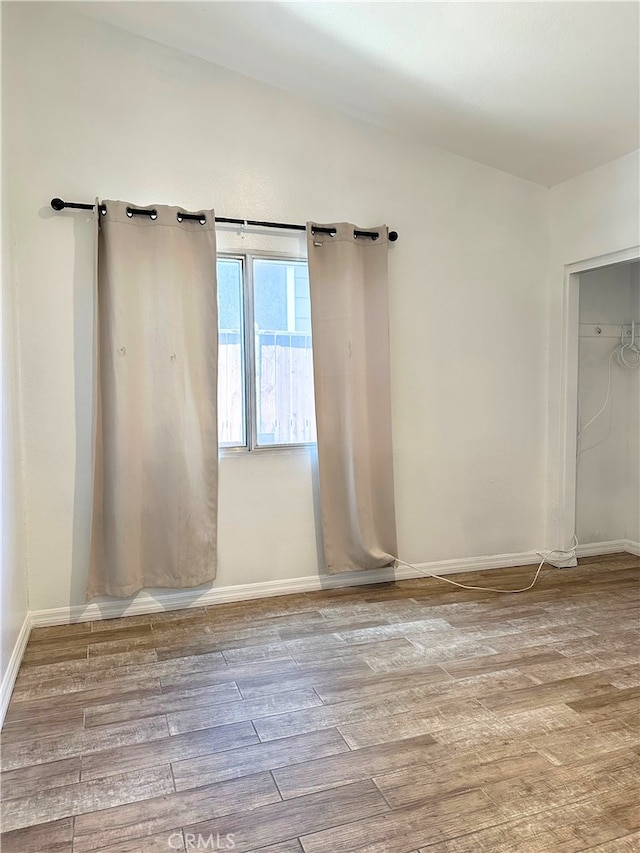 2582 Buchanan Ct, Perris, CA 92571 - unfurnished room featuring wood finished floors and baseboards