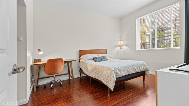 2123 Scholarship, Irvine, CA 92612 - bedroom with wood finished floors, baseboards, and a desk
