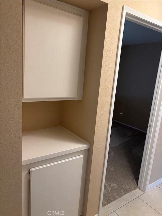 7950 Gardenia, Rancho Cucamonga, CA 91701 - washroom with light tile patterned floors