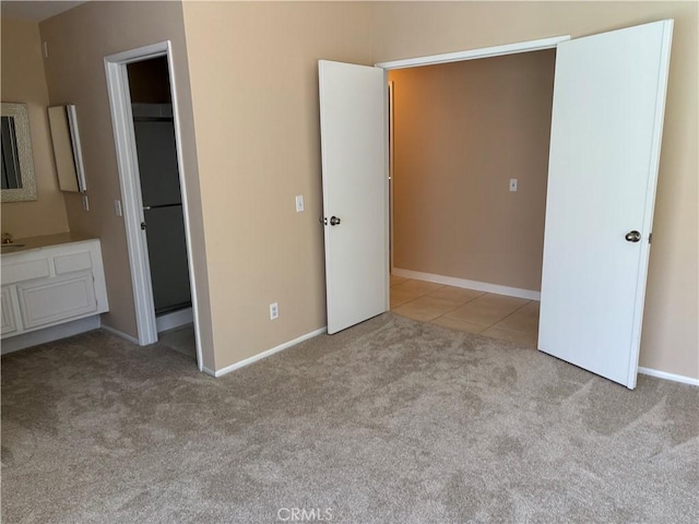 7950 Gardenia, Rancho Cucamonga, CA 91701 - unfurnished bedroom featuring carpet flooring, baseboards, and a walk in closet