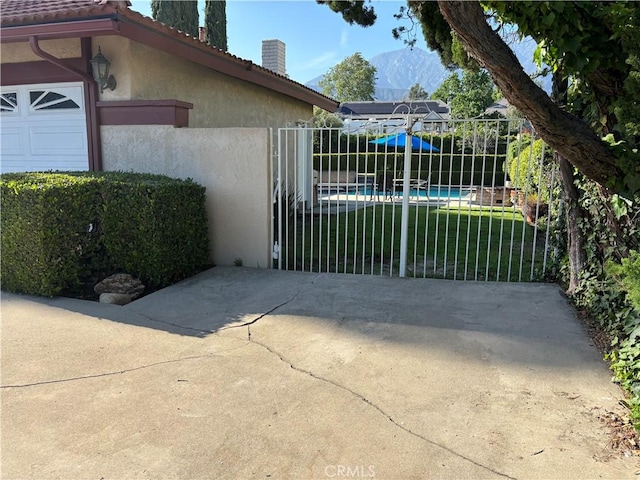 7950 Gardenia, Rancho Cucamonga, CA 91701 - gate featuring a mountain view