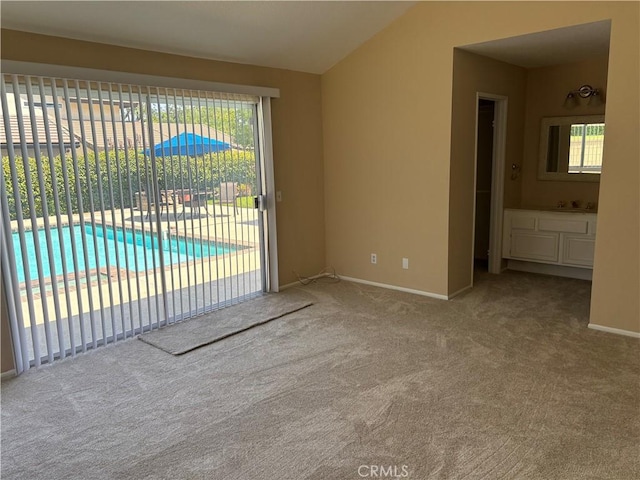 7950 Gardenia, Rancho Cucamonga, CA 91701 - unfurnished living room featuring carpet flooring, plenty of natural light, and baseboards