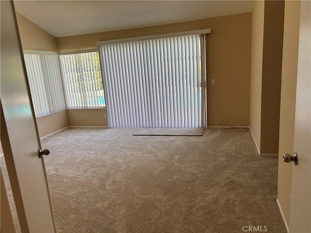 7950 Gardenia, Rancho Cucamonga, CA 91701 - unfurnished room featuring carpet flooring, baseboards, and vaulted ceiling