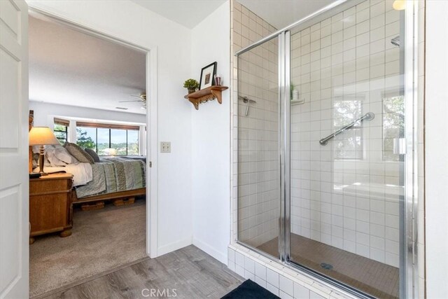 12355 Santa Ana Rd, Atascadero, CA 93422 - ensuite bathroom with wood finished floors, a stall shower, and ceiling fan