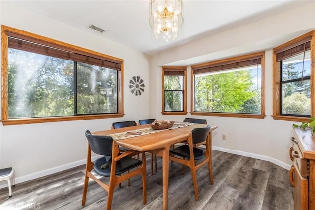 12355 Santa Ana Rd, Atascadero, CA 93422 - dining space featuring baseboards, a chandelier, and wood finished floors
