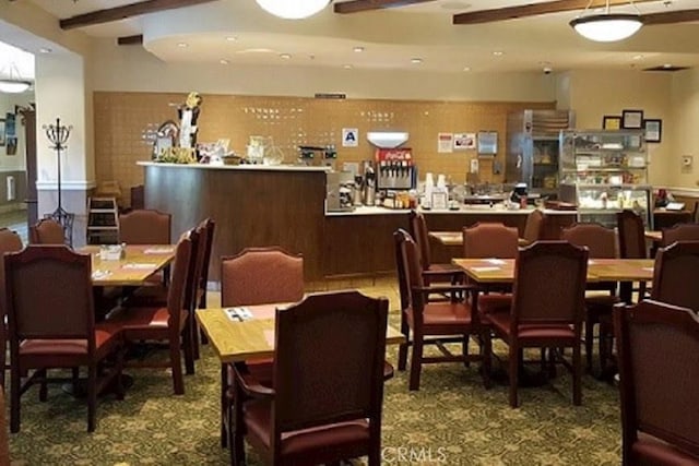 211 Furyk Way, Hemet, CA 92545 - carpeted dining space featuring beamed ceiling