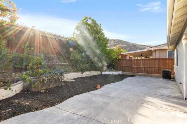 211 Furyk Way, Hemet, CA 92545 - fenced backyard with a patio and a mountain view