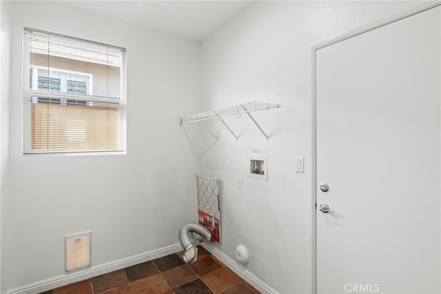 211 Furyk Way, Hemet, CA 92545 - laundry area with washer hookup and dark stone finish flooring