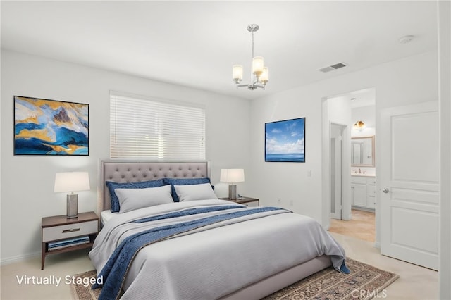 211 Furyk Way, Hemet, CA 92545 - bedroom featuring a chandelier, a sink, ensuite bath, and baseboards