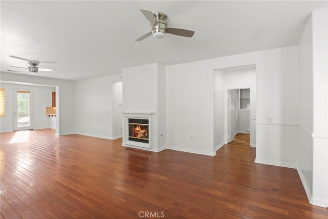 211 Furyk Way, Hemet, CA 92545 - unfurnished living room with ceiling fan, wood-type flooring, and a glass covered fireplace