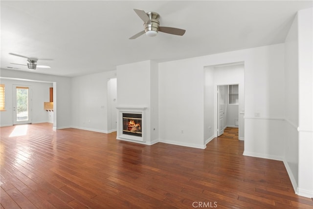 211 Furyk Way, Hemet, CA 92545 - unfurnished living room featuring a ceiling fan, hardwood / wood-style floors, and a glass covered fireplace