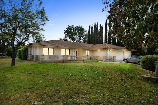 2380 Peppertree Ln, Riverside, CA 92506 - ranch-style home featuring stucco siding, an attached garage, a front lawn, and concrete driveway