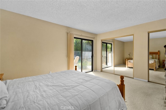 2380 Peppertree Ln, Riverside, CA 92506 - carpeted bedroom featuring access to exterior, multiple closets, and a textured ceiling